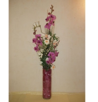 Compositions - Three violet orchids in a cylinder