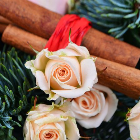 Buy New Year arrangement of fir branches and flowers